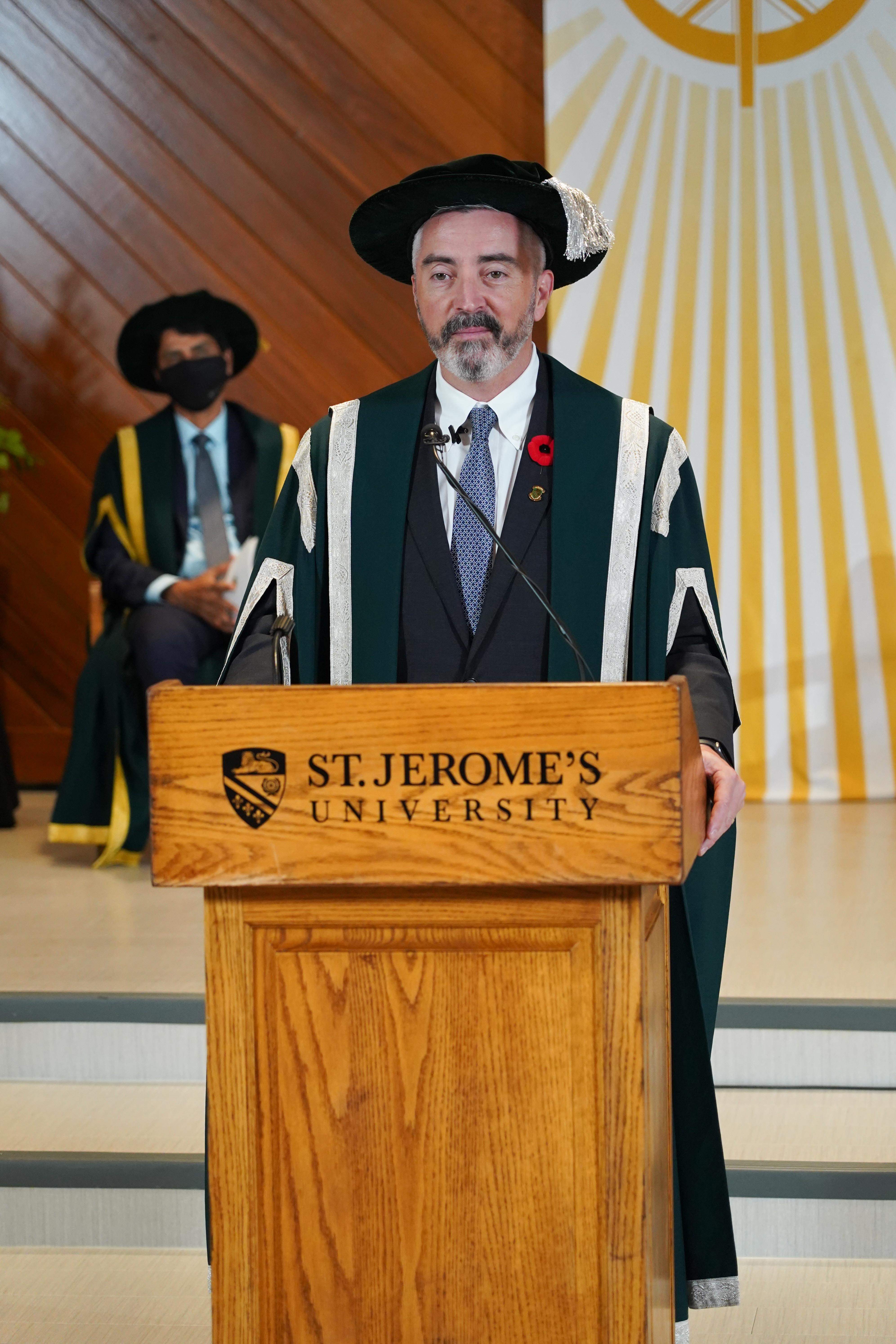 Peter Meehan at podium during Installation Ceremony 