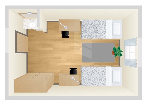 Floor plan of double room showing two single beds, two desks, a wardrobe and a vanity.