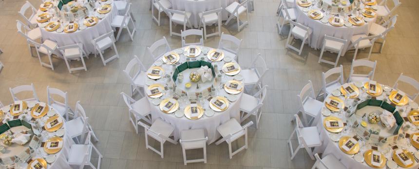 Round tables set up for a banquet